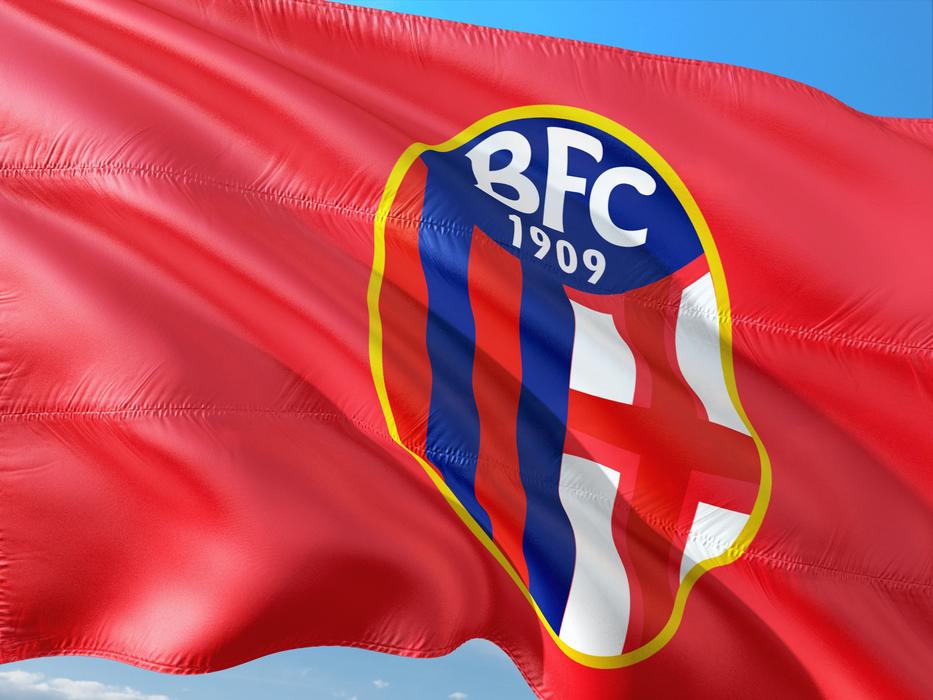 Flag of the Football Club of Bologna at sky