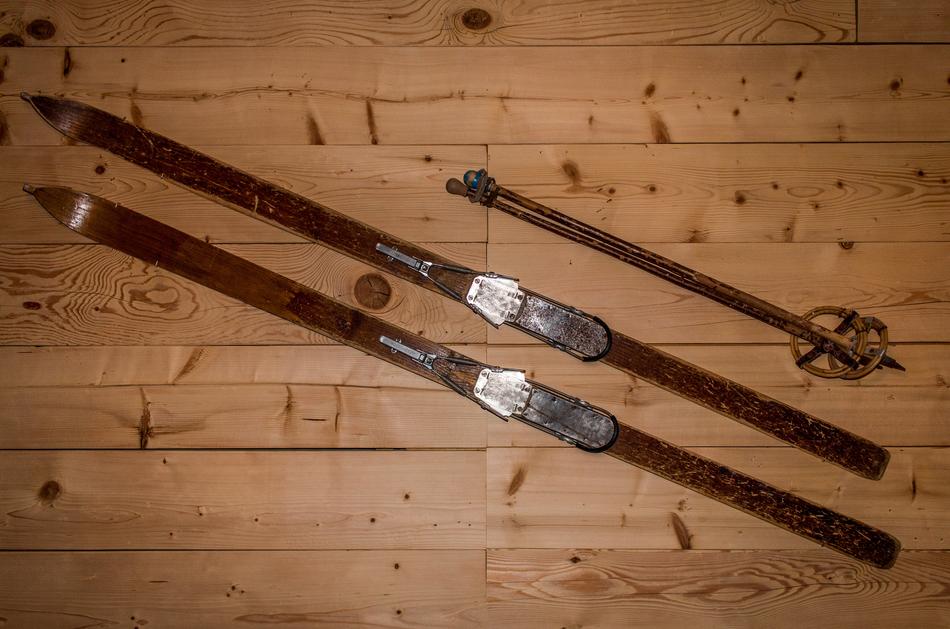 Top view of the beautiful old, retro ski, on the wooden surface in Switzerland
