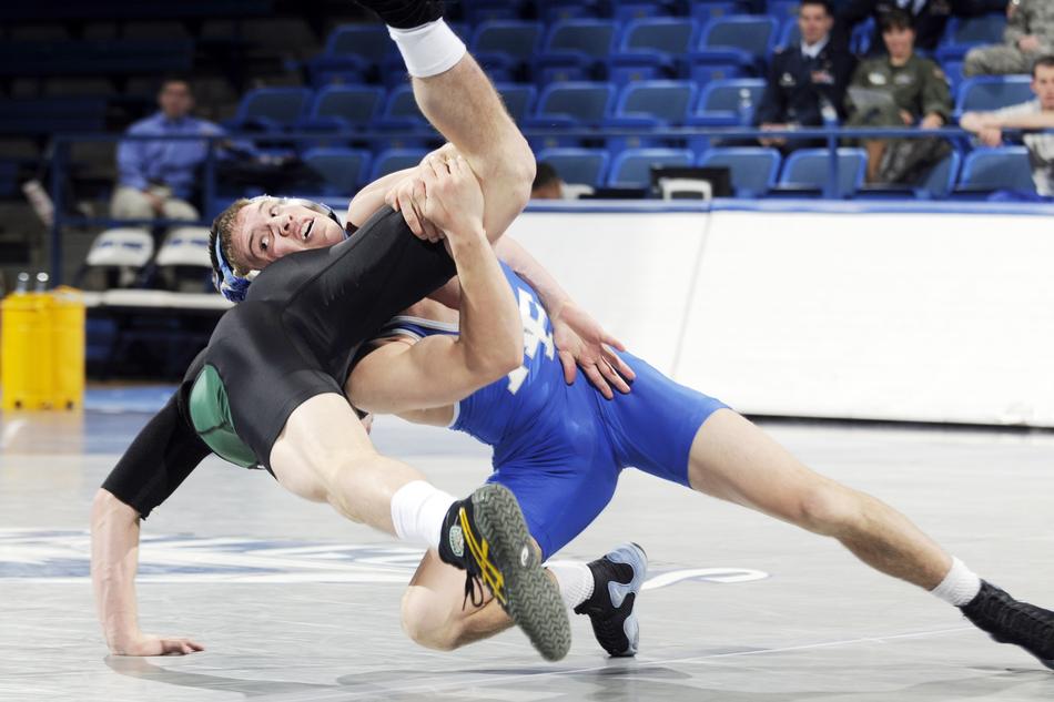 wrestlers in the ring in a college