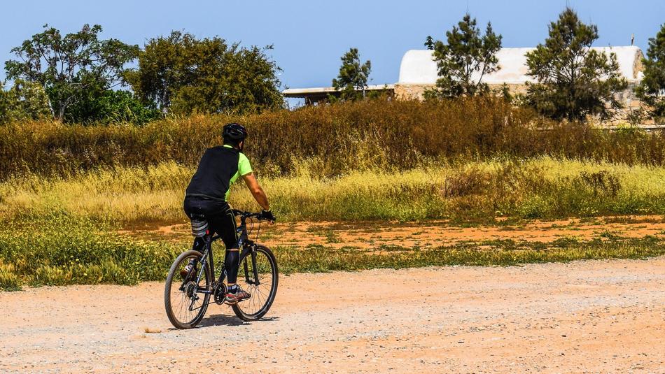 Biker on countryside path