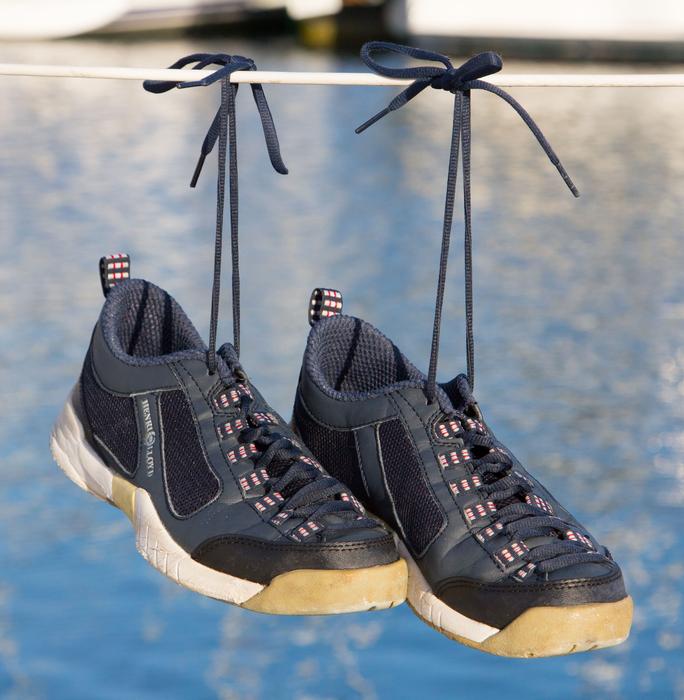 shoes hang on laces close-up