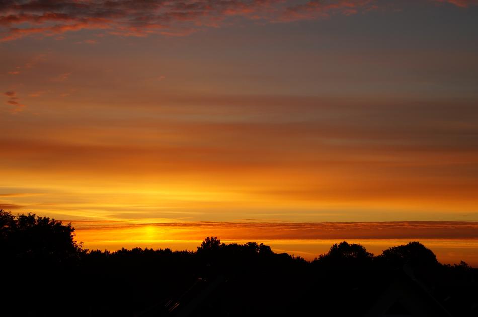 Beautiful landscape at yellow and orange sunrise