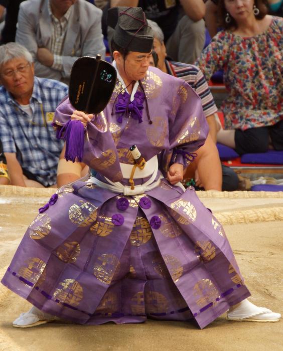 Person, in the beautiful and colorful ceremonial dress, on the ceremony in Japan