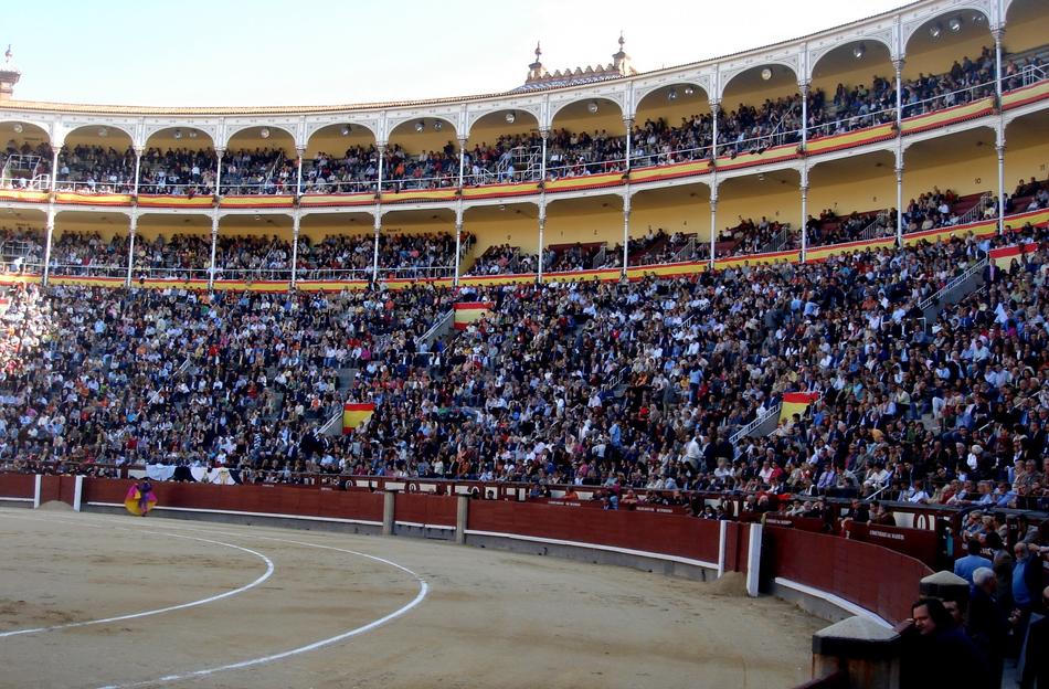 Colorful bullring with the spectators watching