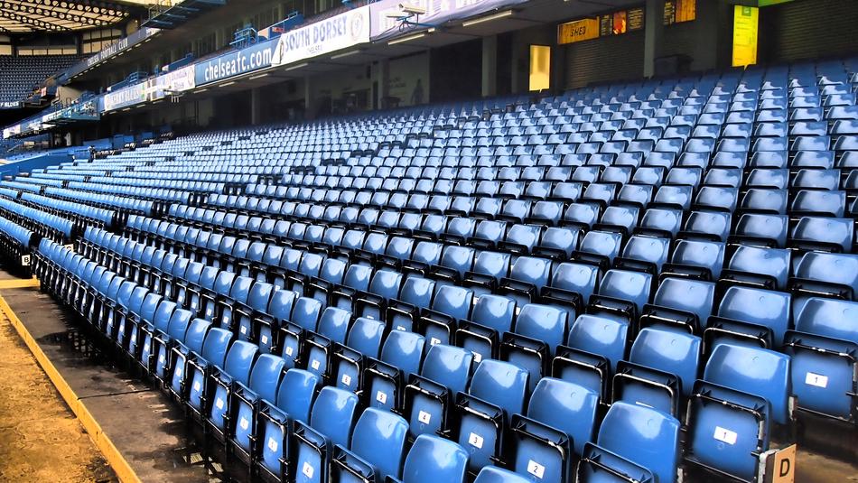 Shiny, blue seats at the stadium of Chelsea, in London, England
