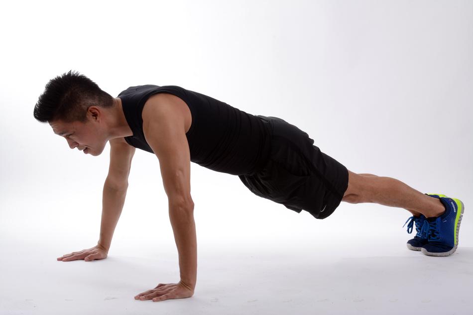 Fitness Exercise in a pose on the hands