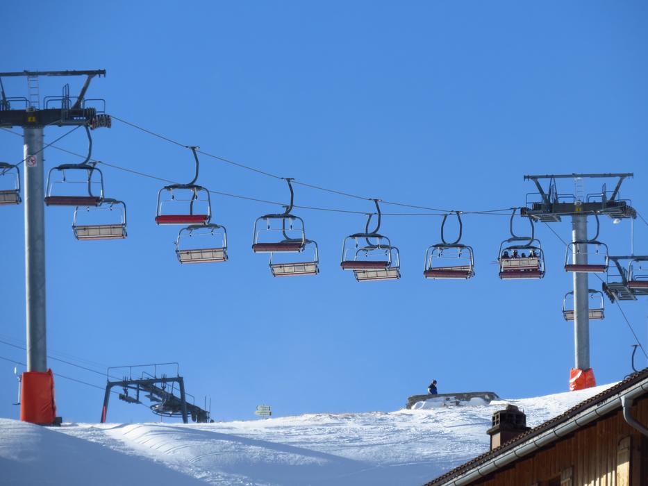 chairlift and Hut on Snowy Mountain