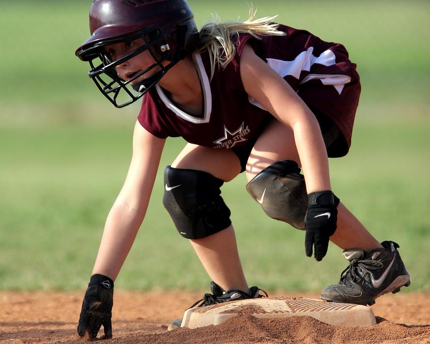 softball player on the field on a blurred background