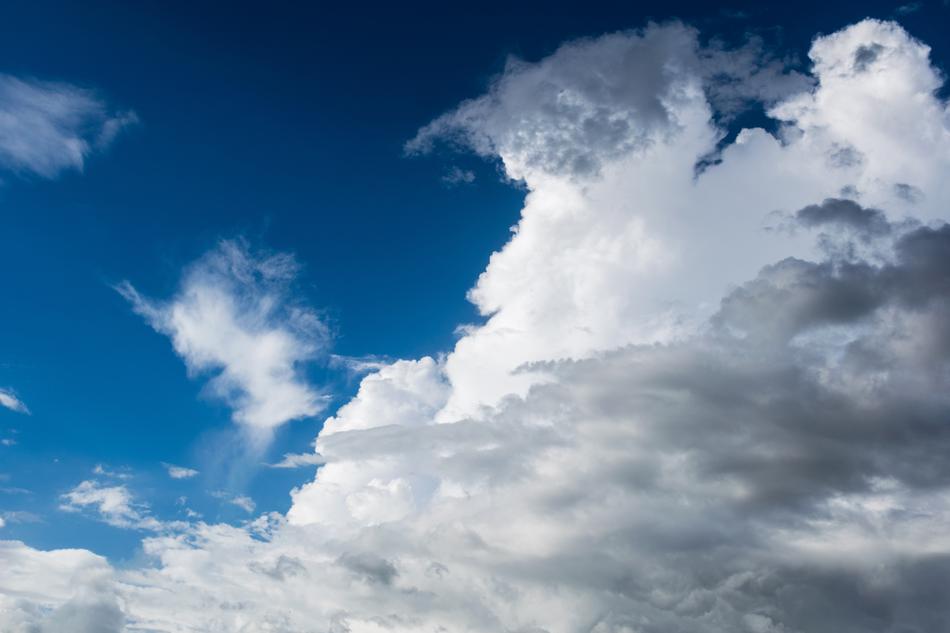 blue sky with white lush clouds
