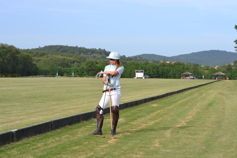woman in uniform on the golf course