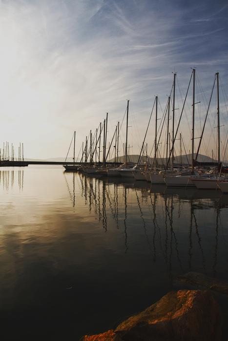 yachts in the harbor at dusk