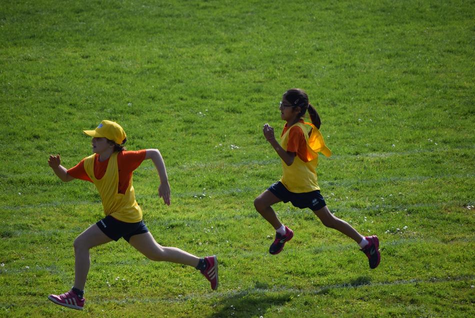 two children running in a competition