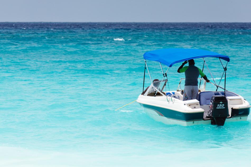 People on the boat, among the beautiful, turquoise and blue water