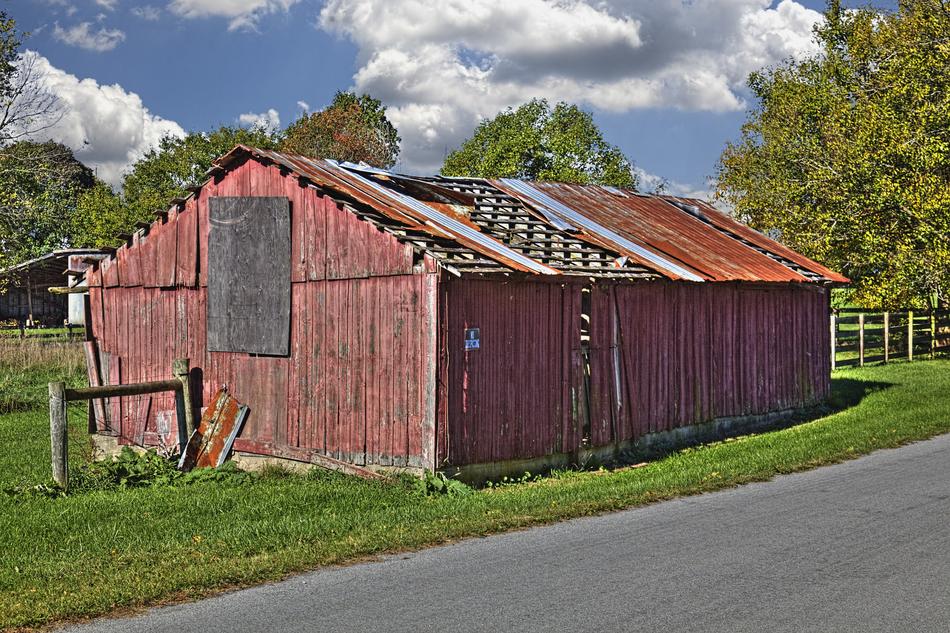 old rustic barn near the road