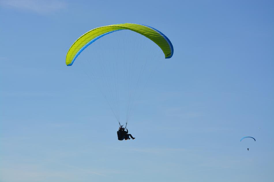 paragliding under the blue sky