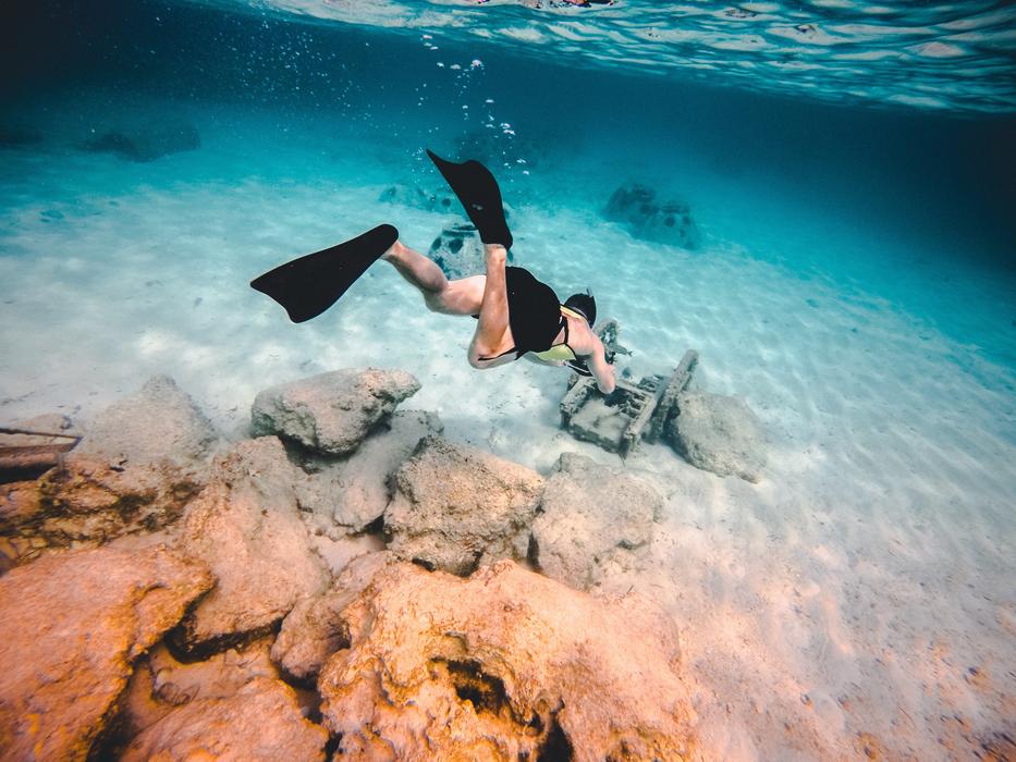 man under water in the ocean