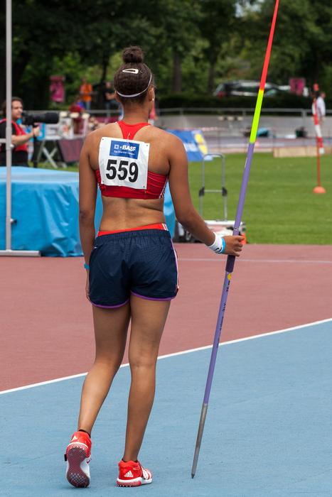 Back view of the woman with number, on the Javelin Throw competition