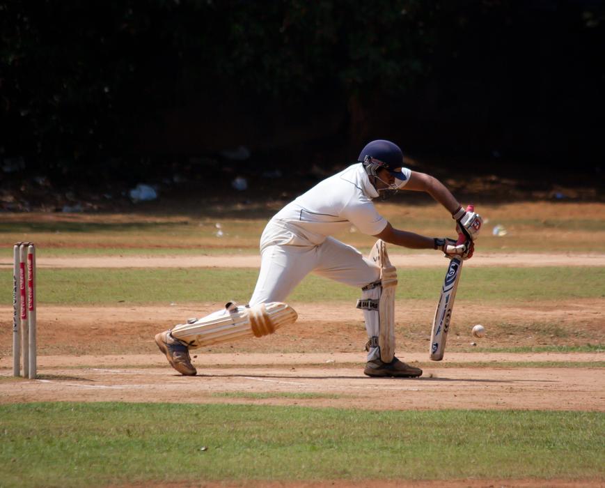 man Cricketer Batting