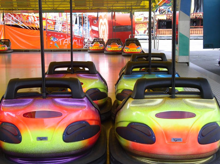 Colorful, shiny bumper cars at the Year Market in Munich, Germany