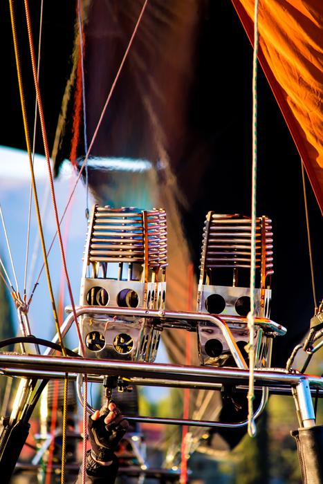 Close-up of the heaters and other details of the colorful hot air balloon