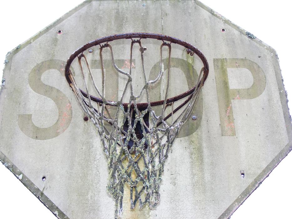 Basketball basket fixed at stop traffic sign