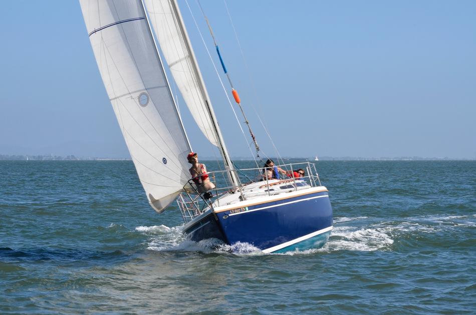 sailboat in the ocean during the wind