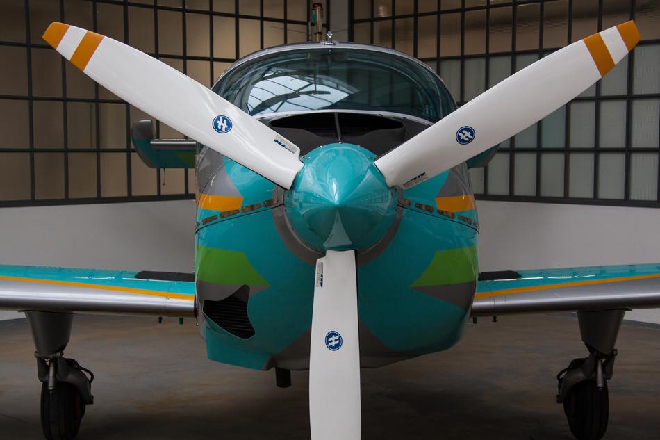Close-up of the shiny propeller of the colorful 'Siat 223 Flamingo'