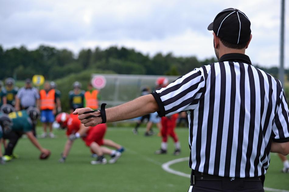 American Football Referee on pitch