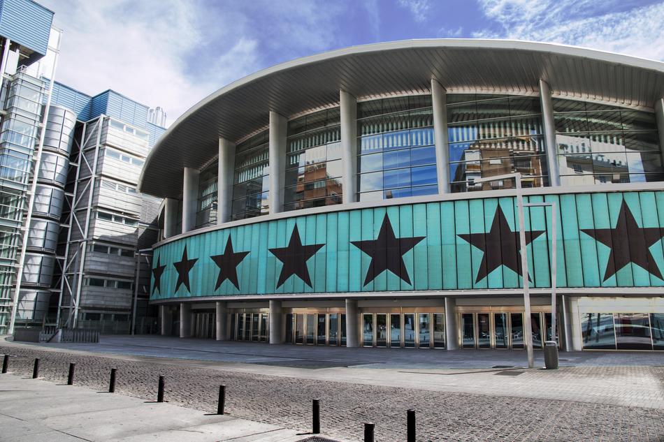 sports palace with stars near the road