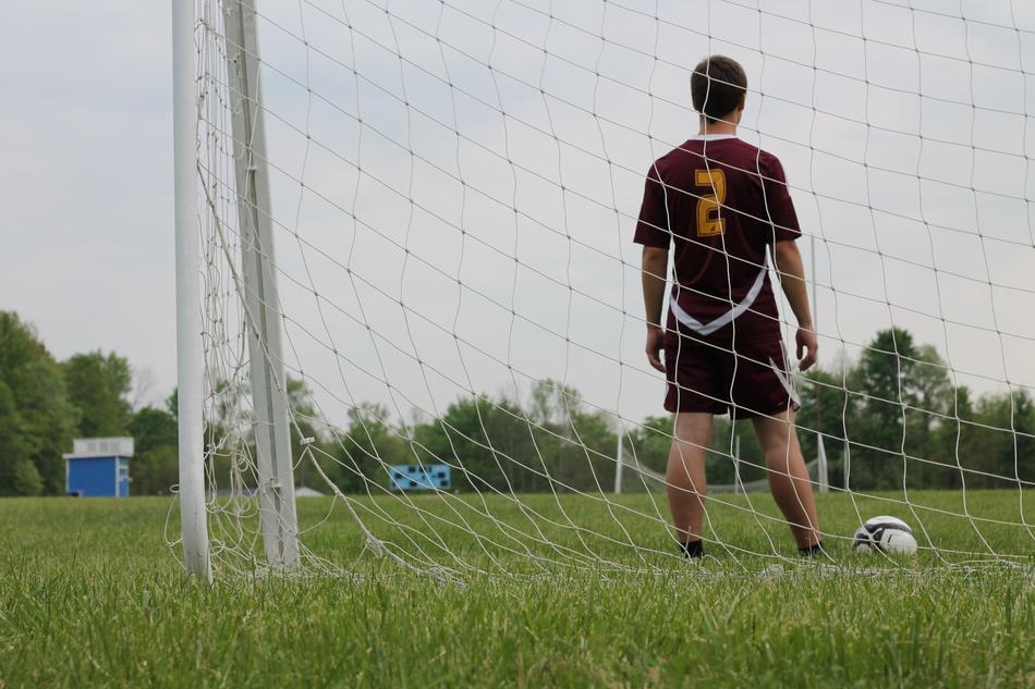 photo of football player on field