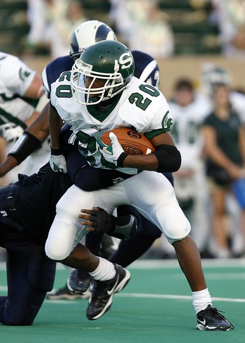Football Running Back in a blurred background