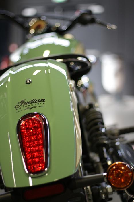 Close-up of the beautiful, shiny, vintage, green 'Indian' motorcycle