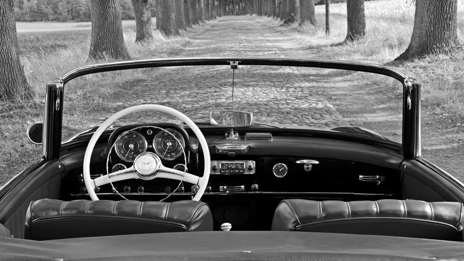 Mercedes 190 Sl Oldtimer Classic on the alley in black and white background