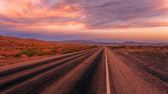 landscape of Road in Desert at Sunset