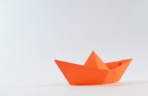 orange origami boat