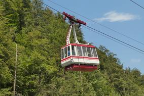 Cable car Feuerkogel, among the beautiful green trees on the mountains in Ebensee, Salzkammergut, Austria