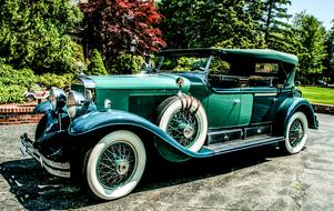 green classic Cadillac