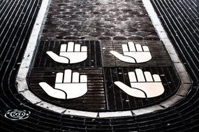 white Hands, Symbols on Cobbled Walkway, france