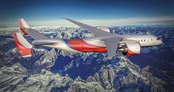 aircraft flying over snowy mountains