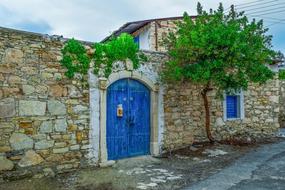 aged stone Wall with blue gates, Traditional Architecture, cyprus, pentakomo