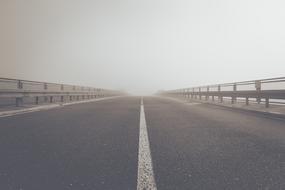 Fog Road into the distance
