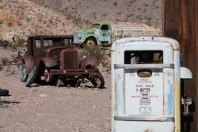 Old lapsed Cars near Rusty fuel pump, Usa, nevada, nelson