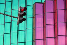 traffic light on the background of the facade of a shopping center in Portugal