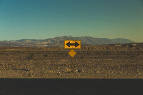 double arrow road sign