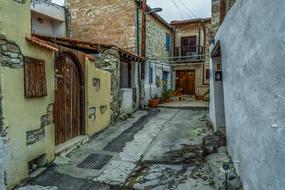 narrow street with traditional architecture in cyprus