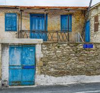 House with blue Windows and Door