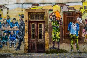 people on colorful graffiti in cyprus