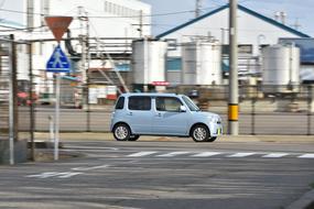 mini car on the road in a blurred background