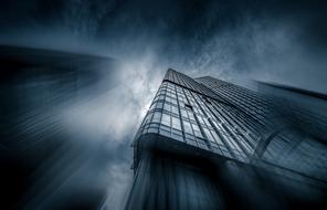 black stormy sky over skyscrapers