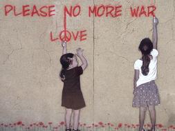 please no more war, love, two child girls near wall with graffiti